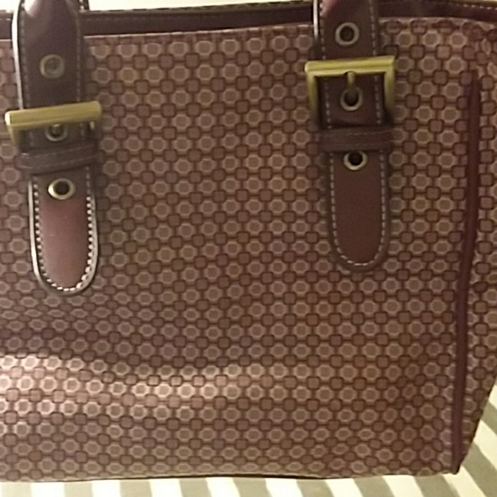 Hand held purse with mini wallet. Burgundy color.